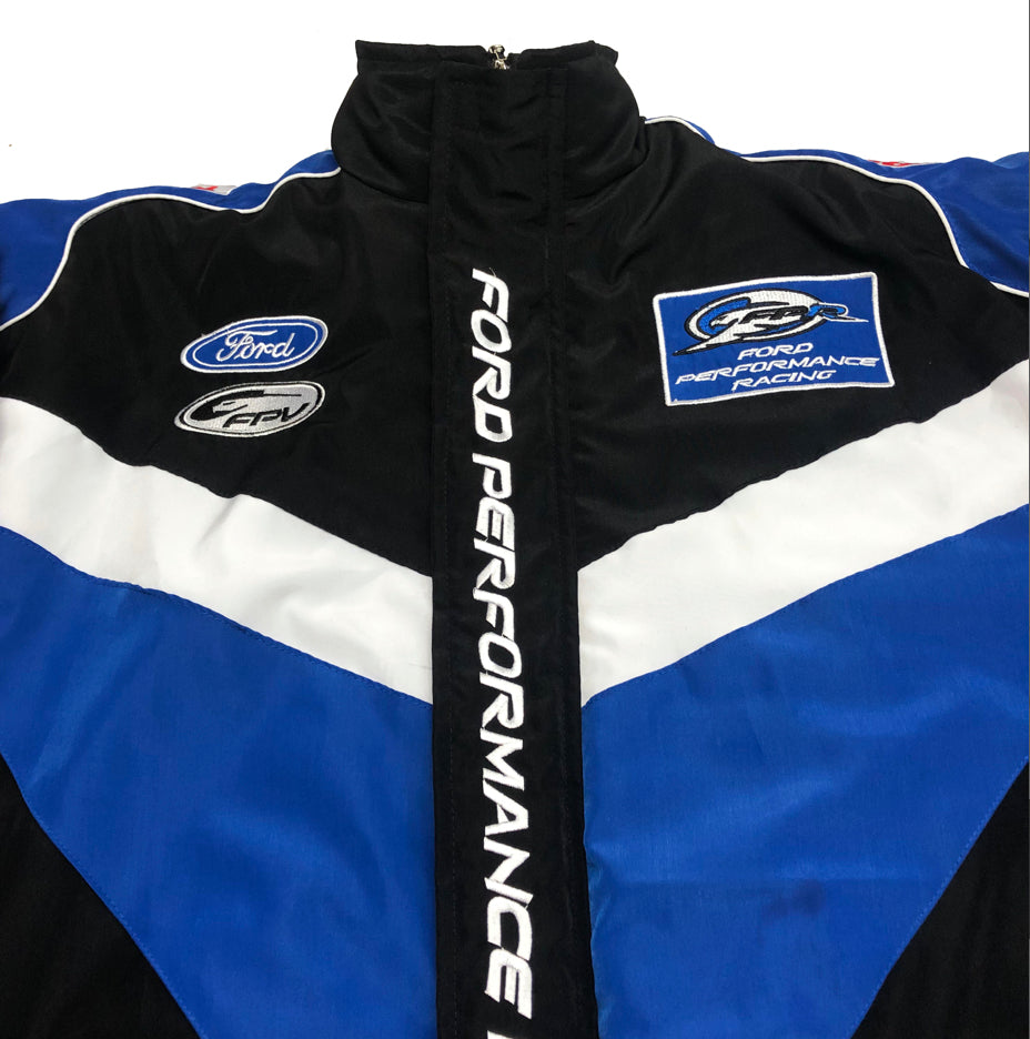 Vintage Ford racing jacket in black and blue with embroidered Ford logos and sponsor patches.