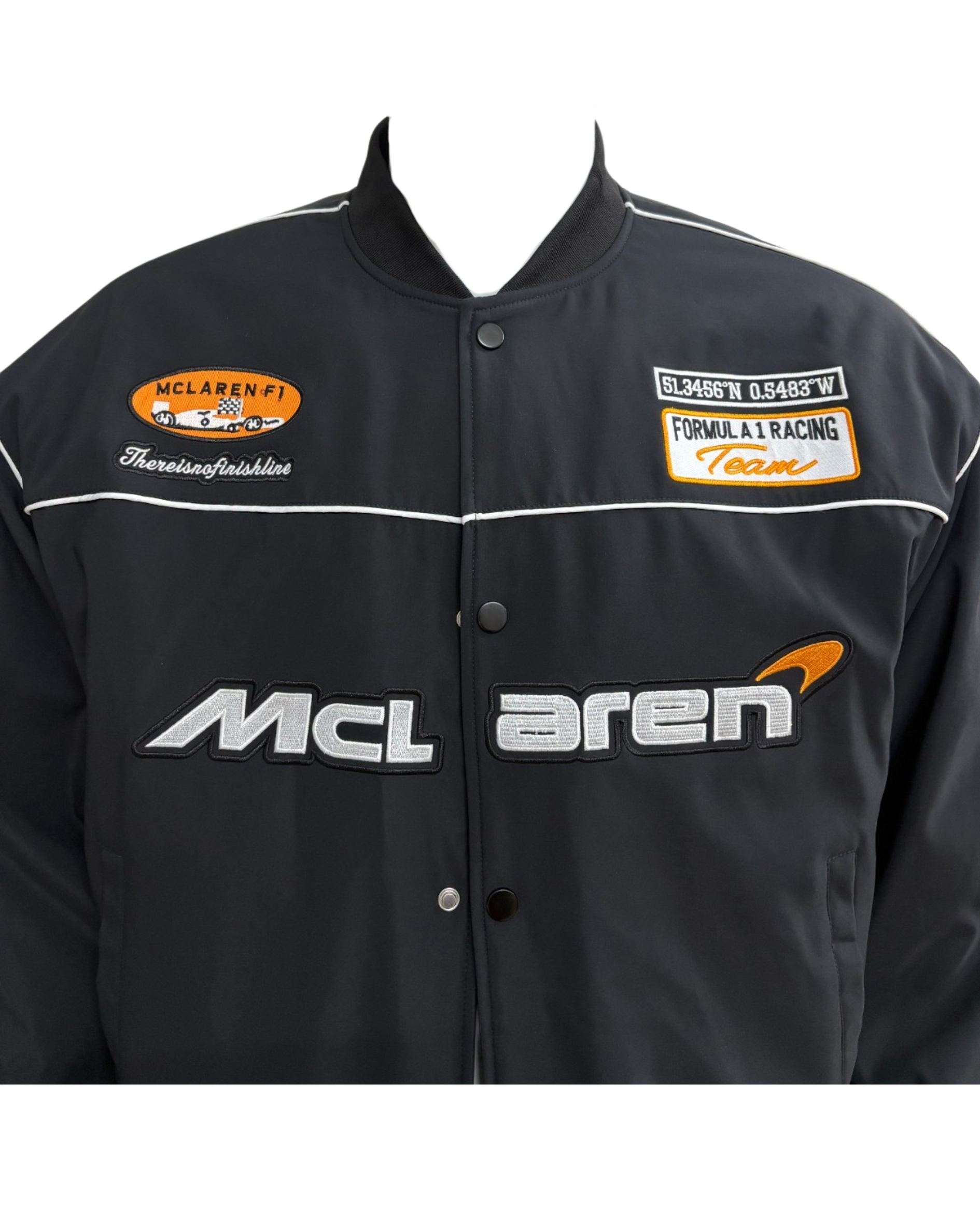 McLaren F1 black racing jacket side view showing sleeve sponsor patches and McLaren branding