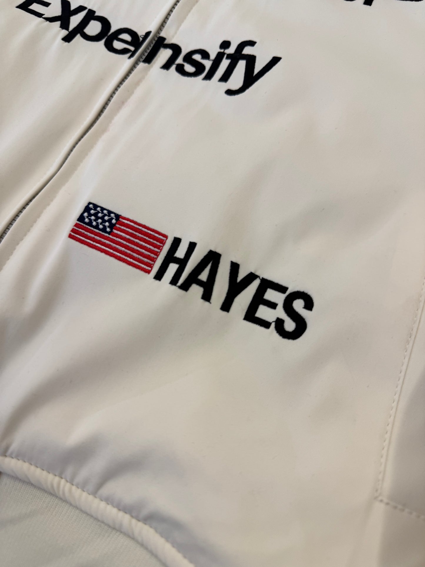APX GP F1 movie jacket flat lay showing full sponsor livery including Mercedes AMG Pirelli and IWC
